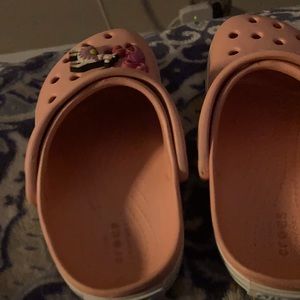 These crocs come with the shoe decorations